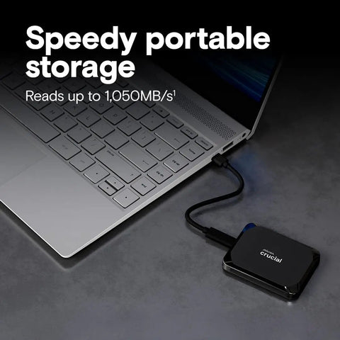 1TB Portable SSD With Blazing 1050 MB Per Second Transfer USB C 3 Point 2 Gen External Solid State Drive connected to laptop