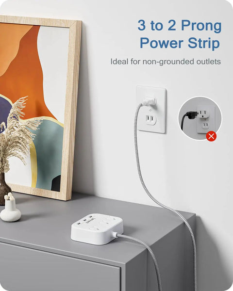 2 Prong To 3 Prong Outlet Adapter With A 6.6 Ft Braided Extension Cord, Polarized Plug, mounted on wall next to decor