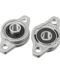 Front view: Two S SYDIEN pillow block bearings with 3/8 in bore, flange mount, self-aligning, zinc alloy steel