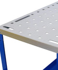 Close-up of Heavy Duty Steel Welding Table 36 By 18 Inch with square holes for custom fixturing and blue frame.