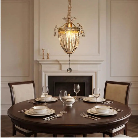 vhhob French Light Luxury Crystal Pendant Lamp Ceiling Hanging Fixture above a dining table set for dinner.