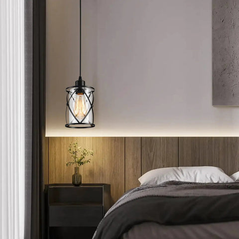 Fresh Matte Black Three Light Pendant With Clear Glass Shades Adjustable Farmhouse Industrial Hanging Fixture For Kitchen Island And Dining Room Decor Solid Home Upgrade Ceiling Lamp hanging above a bedside table.