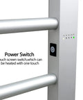 Close-up of Eight Bar Towel Warmer With Timer For Bathroom And Laundry showing power switch and timer settings.