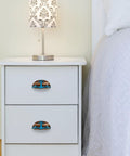 Heavy Duty Construction Hella Smooth Sliding Rustic Cabinet Cup Pulls 6 Pack Drawer Handles on white nightstand.