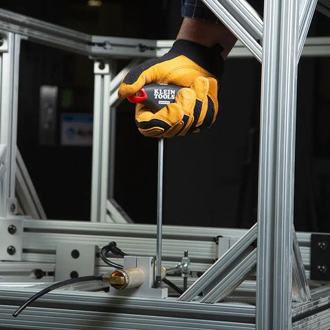 Worker using Tough As Nails T-Handle Hex Key Set With Stand, 10-Piece SAE Inch Wrenches for high torque on metal frame