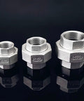 Rock Solid 304 Stainless Steel Coupling Union Pipe Connector Featuring Female To Female Threads For No Sweat Plumbing Jobs And Serious Corrosion Defense in three sizes on a reflective surface.
