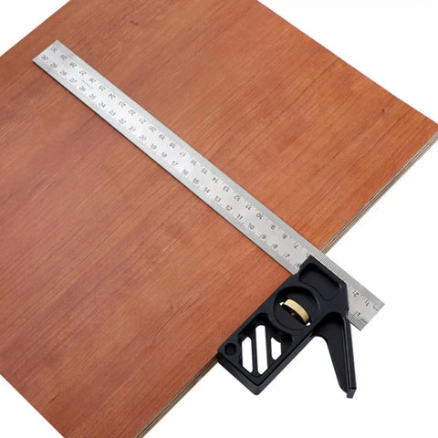 Professional Grade Carpentry Combination Square Layout Ruler With Dead On 45 And 90 Degree Marking on wood sheet for accurate measuring.