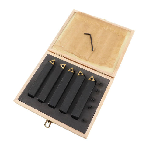 Five-piece carbide turning tool set in a wooden case with black indexable cutters with gold inserts and a hex key