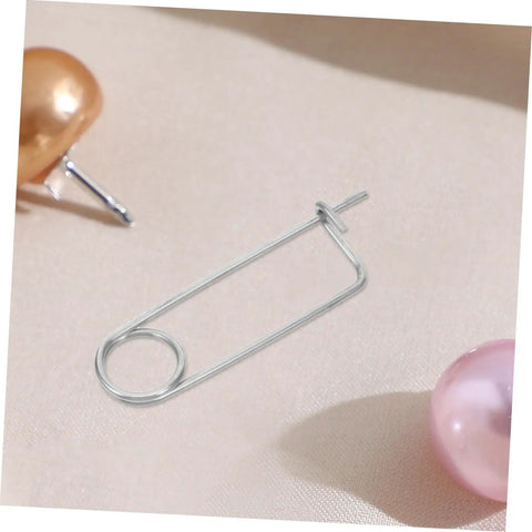 Heavy Duty Stainless Steel Cotter Pin Fastener Clips Locks Farm Hitch And Industrial Machinery With Anti Loosening Stability on fabric.