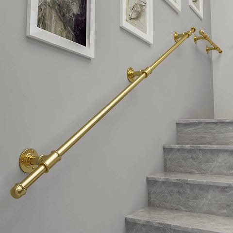 Heavy Duty Gold Wall Mount Staircase Handrail Kit No Sweat Setup Wrought Iron Banister Bracket Set Quick Install Indoor Outdoor Safety Step Railing 17 Foot Long on grey wall with steps