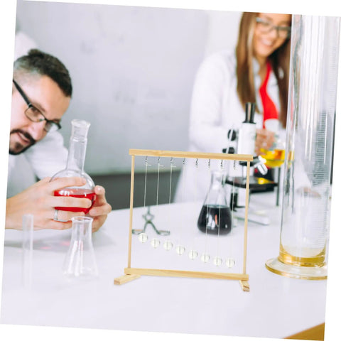 Hands On Energy Conservation Science Kit For Students With A Snake Shape Pendulum Project in a classroom setup