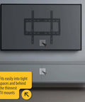 DataComm Electronics wall plate with brushes for hiding low-voltage cables behind a wall-mounted TV