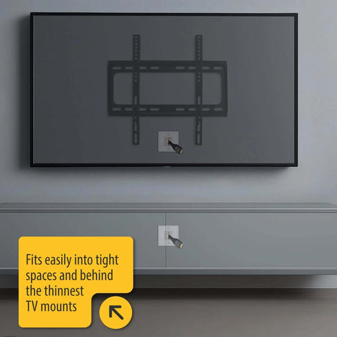 DataComm Electronics wall plate with brushes for hiding low-voltage cables behind a wall-mounted TV