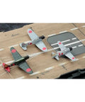 Top Shelf Japanese Imperial Akagi Aircraft Carrier Scale Model Kit With Drop Dead Detail And Foolproof Fit Designed For Serious Hobbyists Looking For A Killer Weekend Project featuring two detailed aircraft on deck.