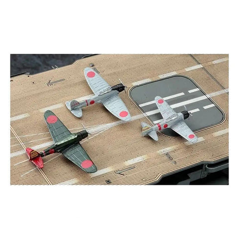 Top Shelf Japanese Imperial Akagi Aircraft Carrier Scale Model Kit With Drop Dead Detail And Foolproof Fit Designed For Serious Hobbyists Looking For A Killer Weekend Project featuring two detailed aircraft on deck.