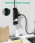 Heavy Hitter 12 Outlet Surge Protector Power Strip with super roomy layout mounted on wall, featuring 12 outlets and visible devices.
