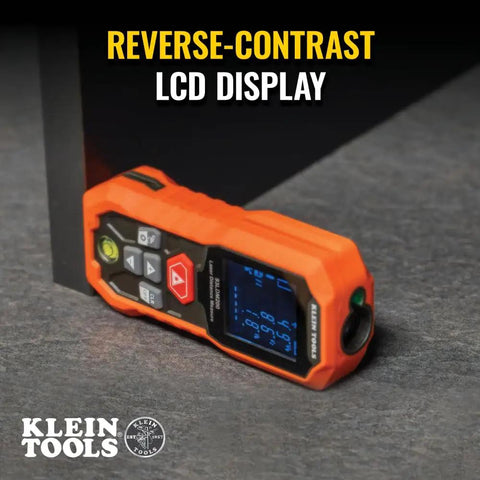 Green Laser Distance Measure Tool with 200 Foot Range for DIY and Pros displaying reverse-contrast LCD on floor