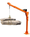 Heavy Duty Truck Mounted Crane Hoist With 1100 Lb Capacity And 12 Volt Electric Winch lifting large stone on pickup truck.