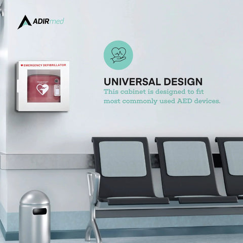 AdirMed white wall-mounted AED cabinet with red defibrillator inside; waiting area with gray chairs