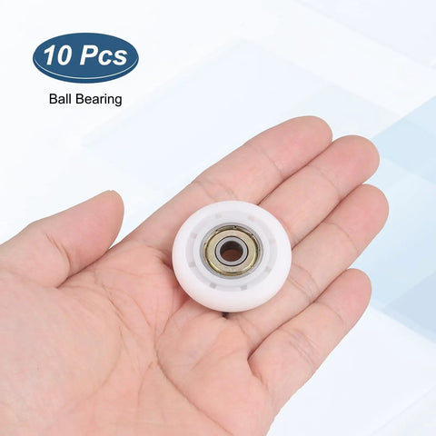 Hand holding a 10 Pack 626ZZ Ball Bearing Nylon Guide Pulley Roller Wheel 6x35x8mm Chrome Steel Shielded Bearings With Nylon Outer Ring for heavy duty use