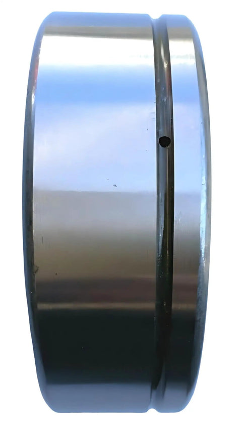 Side view of Beefed-Up Disc Harrow Bearing with dual triple lip seals, 2-3/16 inch bore and 3.937 inch OD, for APC Farm Harrows