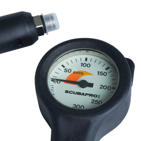 Close-up of Compact Brass Case Diving Pressure Gauge With Metric Display, Rubber Boot and 34.5 Inch HP Hose, 0-300 Bar Readout