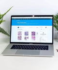 Shield Your Webcam Today With This Sleek Pink Slide Cover For Laptops Phones And Tablets featuring smooth metal slider on MacBook Pro.