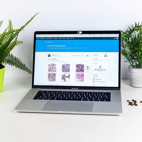 Shield Your Webcam Today With This Sleek Pink Slide Cover For Laptops Phones And Tablets featuring smooth metal slider on MacBook Pro.