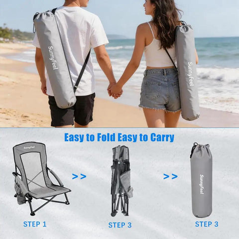 Couple carrying Low Profile Folding Beach Chair Twin Pack With Mesh Back and Cup Holder, easy to fold and carry on a beach