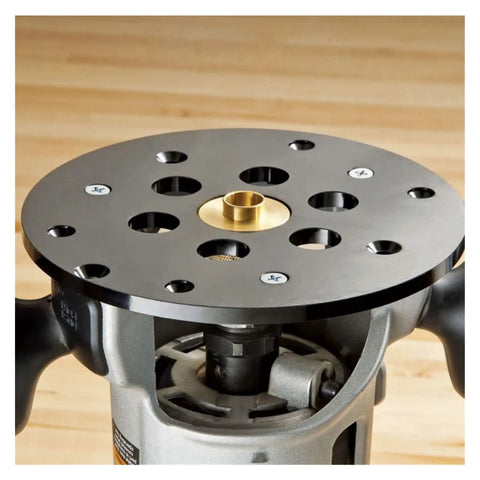 Solid As A Rock Metric Brass Router Guide Bushing Set on a router base for precise template tracking in woodworking.