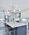 Brushed Nickel 6 Light Dope Sputnik Chandelier For Dining Room Kitchen Island Modern Industrial Pendant Light With Adjustable Arms And Dual Suspension Options hanging in modern kitchen.