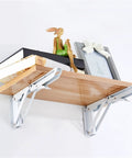 Two Pack Heavy Duty Folding Shelf Brackets Stainless Steel Collapsible Mounts with wood shelf and decor items