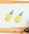 Close-up of Heavy Duty Sliding Gate Guide Rollers Set Nylon Gate Wheels for Smooth Quiet Operation, 4 pcs, on wooden surface.