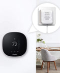 Ecobee thermostat on wall with AC 24 Volt Transformer And C Wire Adapter For Ring Doorbell And Smart Thermostats, Works With Ecobee Sensi Honeywell Nest, 315 Inch Cable, Keeps Your Smart Home Gear Powered And Ready