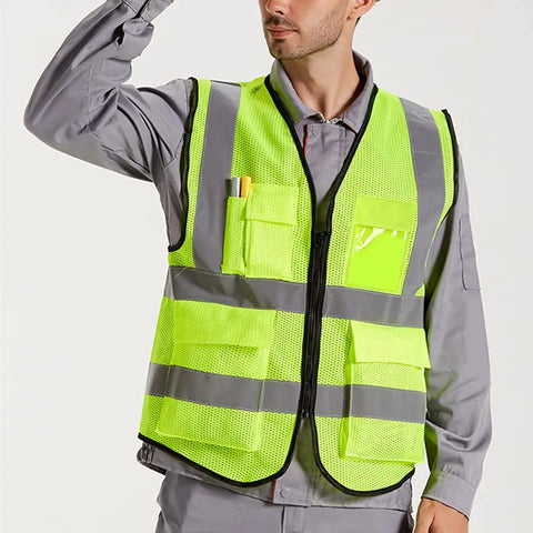 Man wearing High Visibility Reflective Safety Vest For Men And Women With Pockets Breathable Mesh Fabric Machine Washable Hi Vis Vest ANSI Certified Yellow Loose Fit Large All Day Everyday Work