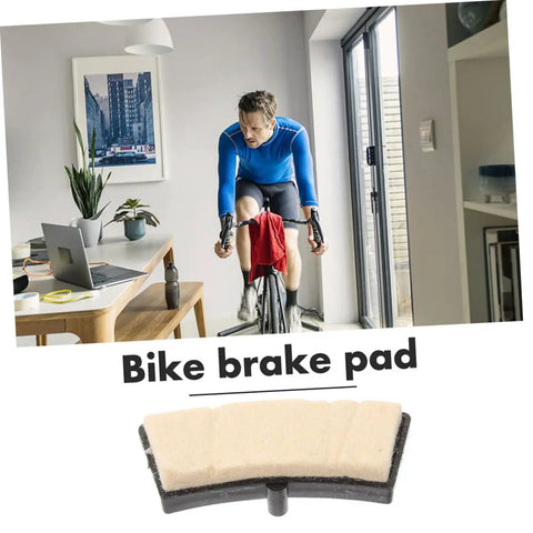 Universal Indoor Bike Brake Pads For Stationary Cycles in home setup, shown with exercise bike and study table.