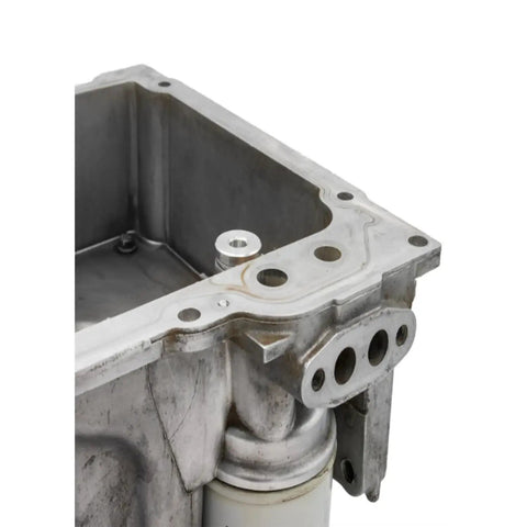 Billet Aluminum LS Oil Pressure Relief Valve Plug Machined For Knockout Engine Blocks And LS Swap Builds in engine block close-up.