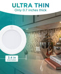 Wireless LED Puck Light With Remote Control For Under Cabinet Closet And Counter Lighting, shown under kitchen cabinet
