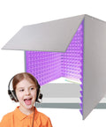Portable Vocal Booth Cover Featuring High Density Sound Absorbing Foam Panels, Desktop Recording Rig, Echo Erasing Acoustic Shield with child using headset.