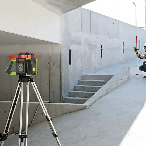 Heavy Duty Electronic Self Leveling Rotary Red Laser Level Kit on tripod in construction area for horizontal alignment.