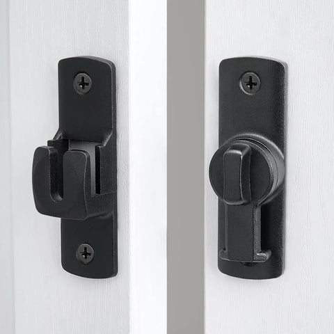 Close-up of 90 and 180 degree flip barn door lock for privacy and security, adjustable latch hardware installed on a white door.
