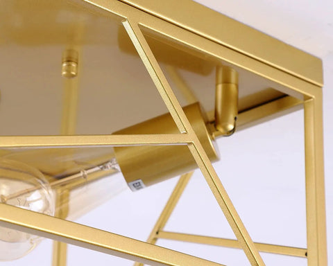 Close-up of Two Light Modern Gold Flush Mount Ceiling Fixture with Metal Square Design showing bulb and frame detail.