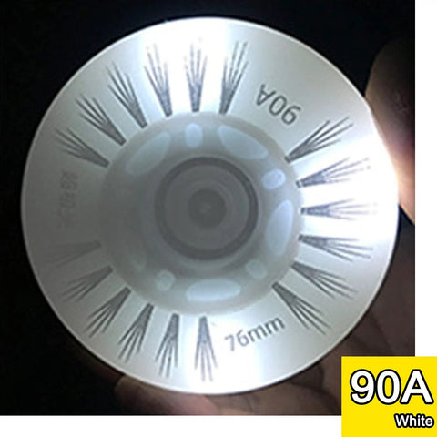 Glow In The Dark Inline Skate Wheels 76mm 80mm With ABEC 9 High Speed Bearings For Indoor And Outdoor Use 4 Pack White 80mm Includes 8 Installed Bearings For A Smooth Sick Ride glowing under light.