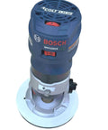 Bosch Colt GKF125CE router with white phenolic baseplate, compatible with Rock Hard Solid White Phenolic Router Bushing Plate Compatible With Bosch Colt Pro10E Pr20EVS And GKF125CEN Trims Compact Models Easy Snap Fit Setup No Drama Required Top Tier Upgrade For Weekend Heroes And Master Craftsmen.