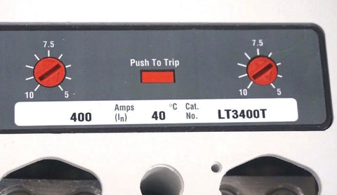 Heavy-Duty Circuit Breaker, Built Like A Tank For 400 Amp Service, control panel showing amp settings and trip button.