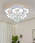 Lit Six-Head Crystal LED Flush Mount Ceiling Light With Remote Control mounted on a ceiling, modern chandelier style
