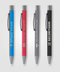 Four colorful metal mechanical pencils with branding, featuring a sleek design and various colors, including gunmetal finish.