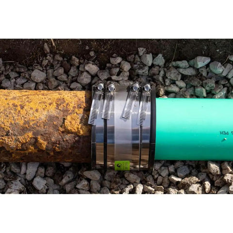 4 Inch Shielded Below Ground Sewer Pipe Coupling For Cast Iron Plastic Or Steel To Cast Iron Plastic Or Steel Plumbing Waste Connections With Elastomeric PVC Wrapped In 300 Series Stainless Steel For Heavy Duty Loads And No Fuss Pipe Alignment on underground sewer pipes