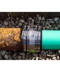Six Inch Shielded Below Ground Sewer Pipe Coupling For Clay To Cast Iron Or Plastic Waste Lines, stainless steel wrap connecting rusted and PVC pipes.