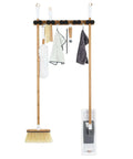 Get A Grip Wall Mounted Mop And Broom Organizer Made Of Lightweight Bamboo With Foam Pegs, tools hanging, front view